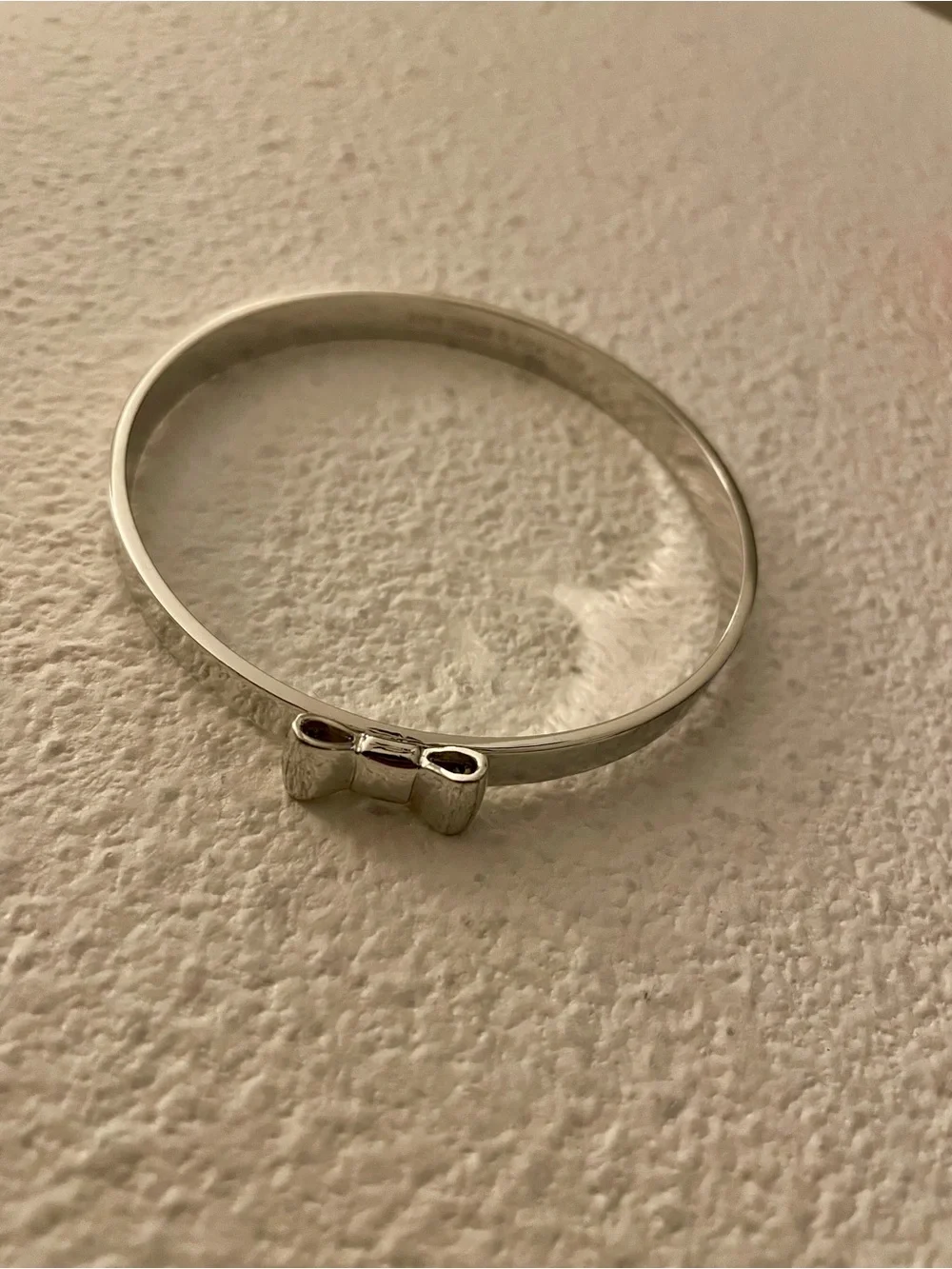 kate spade silver-tone bow bangle bracelet